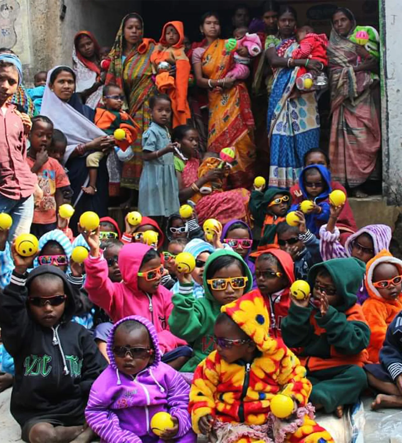 Children smiling at a Save Some Smiles donation drive