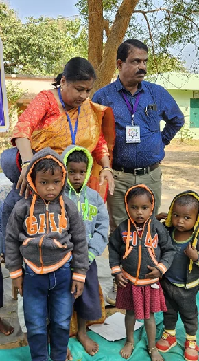 Volunteers distributing essentials to villagers